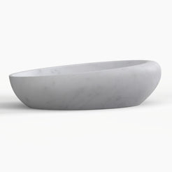Selema Carrara marble vessel sink, asymmetric oval bowl, showing the complete exterior profile