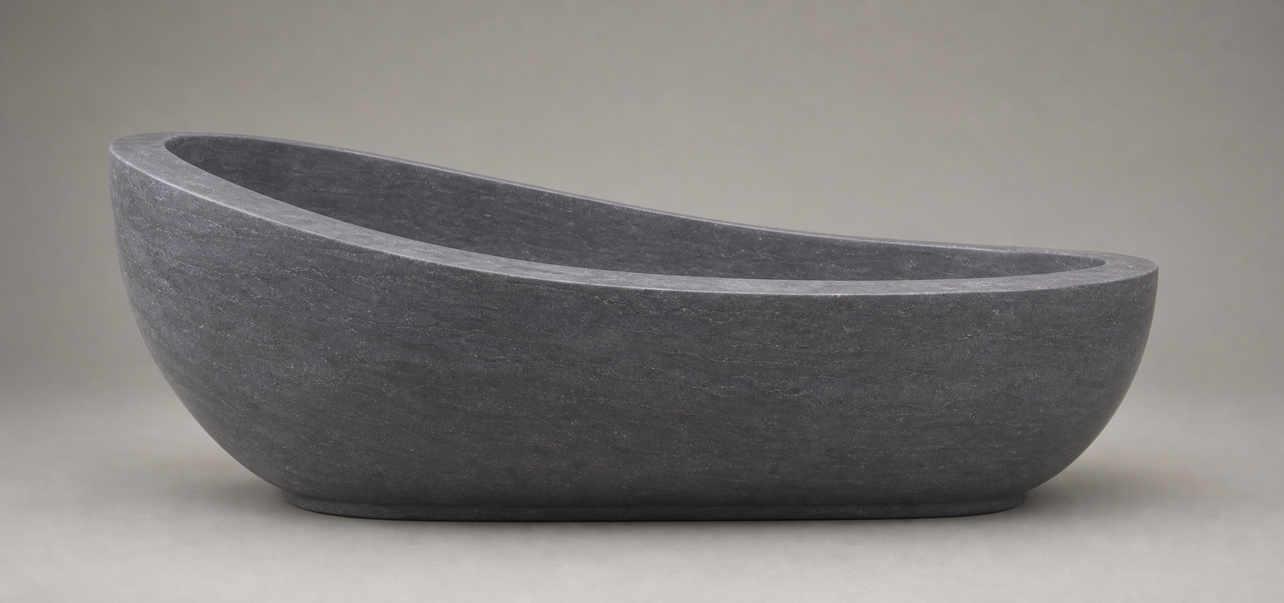 Selene Blue-Gray Granite bathtub, premium asymmetrical side-profile studio view