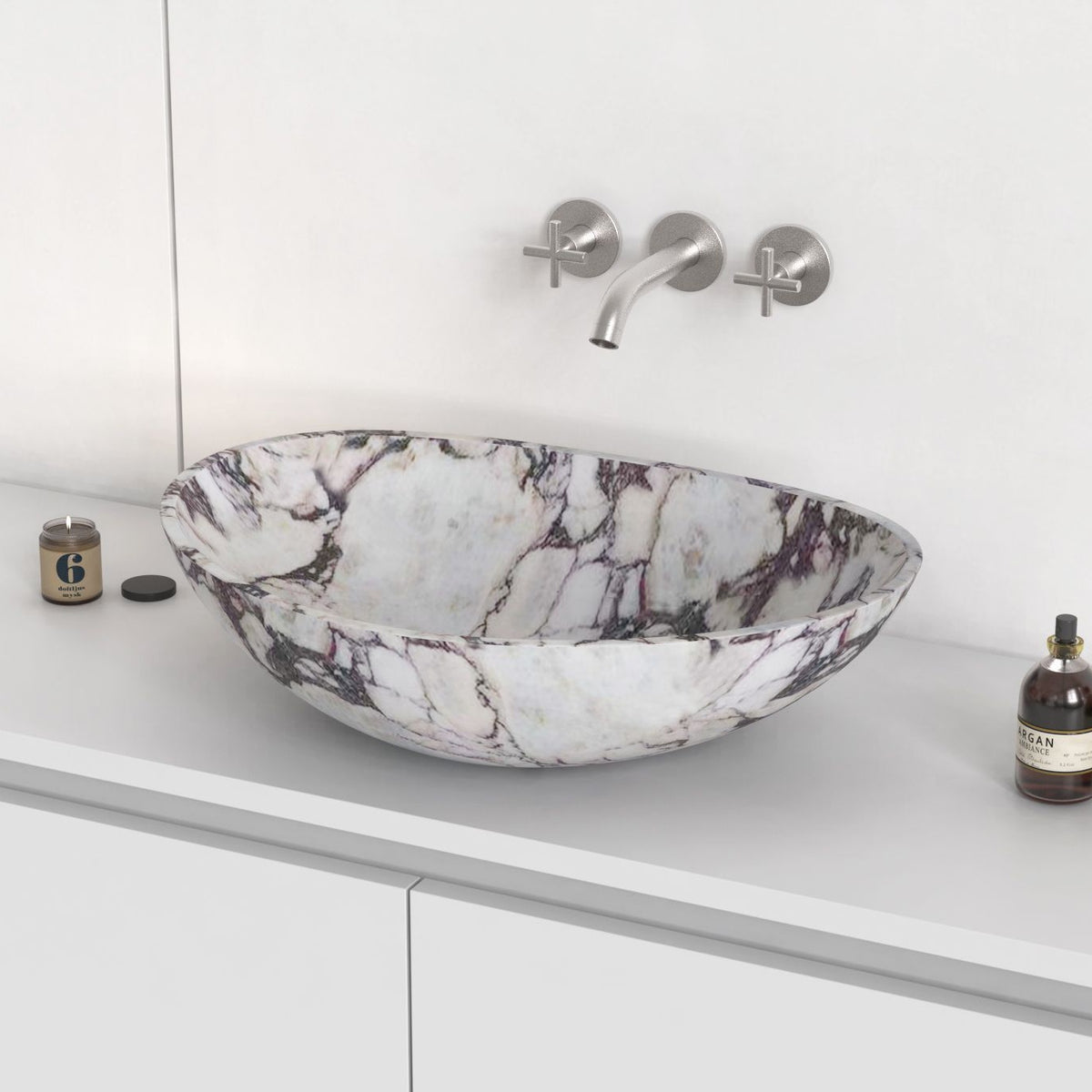 Selva Calacatta marble vessel sink on a countertop, hero lifestyle view