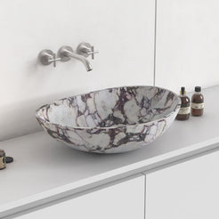 Selva Calacatta marble vessel sink from the opposite countertop angle
