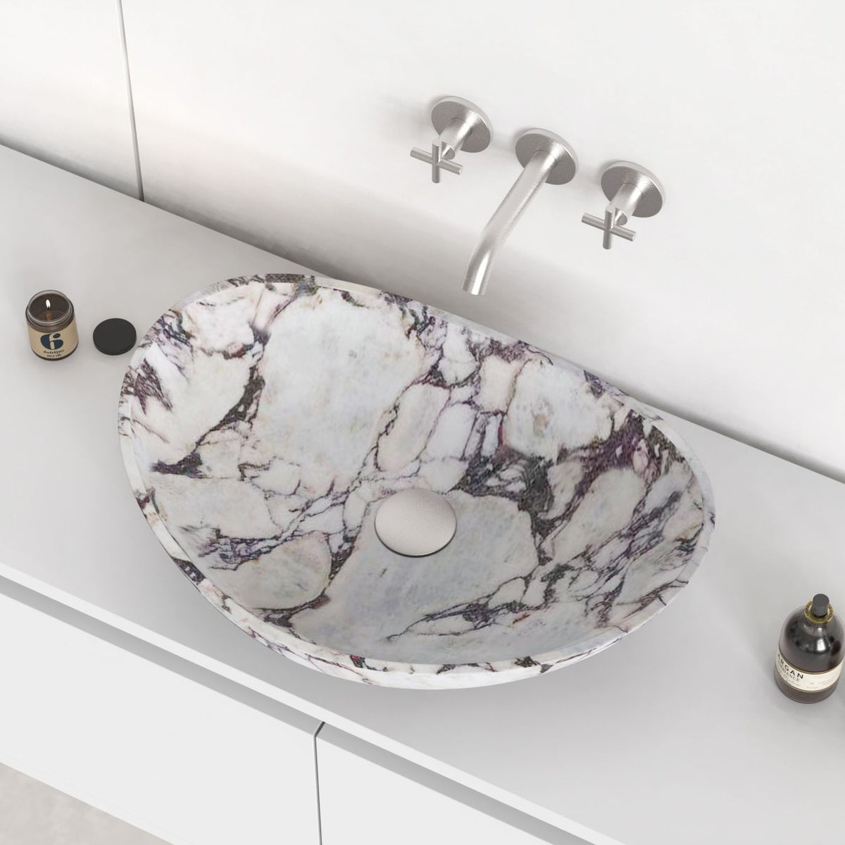 Selva Calacatta marble vessel sink in an elevated countertop view