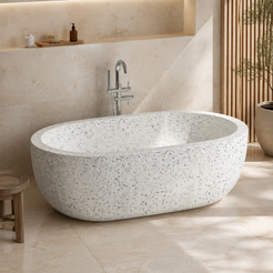 Serelle Soft-Capsule Freestanding Soaking Bathtub – Alba White Terrazzo in a warm ivory-limestone luxury bathroom; exact product geometry and material preserved