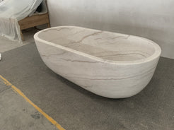 Serena BT-105A Ivory Cloud Marble bathtub, original product reference view; source photograph reframed without changing the stone, rim or silhouette