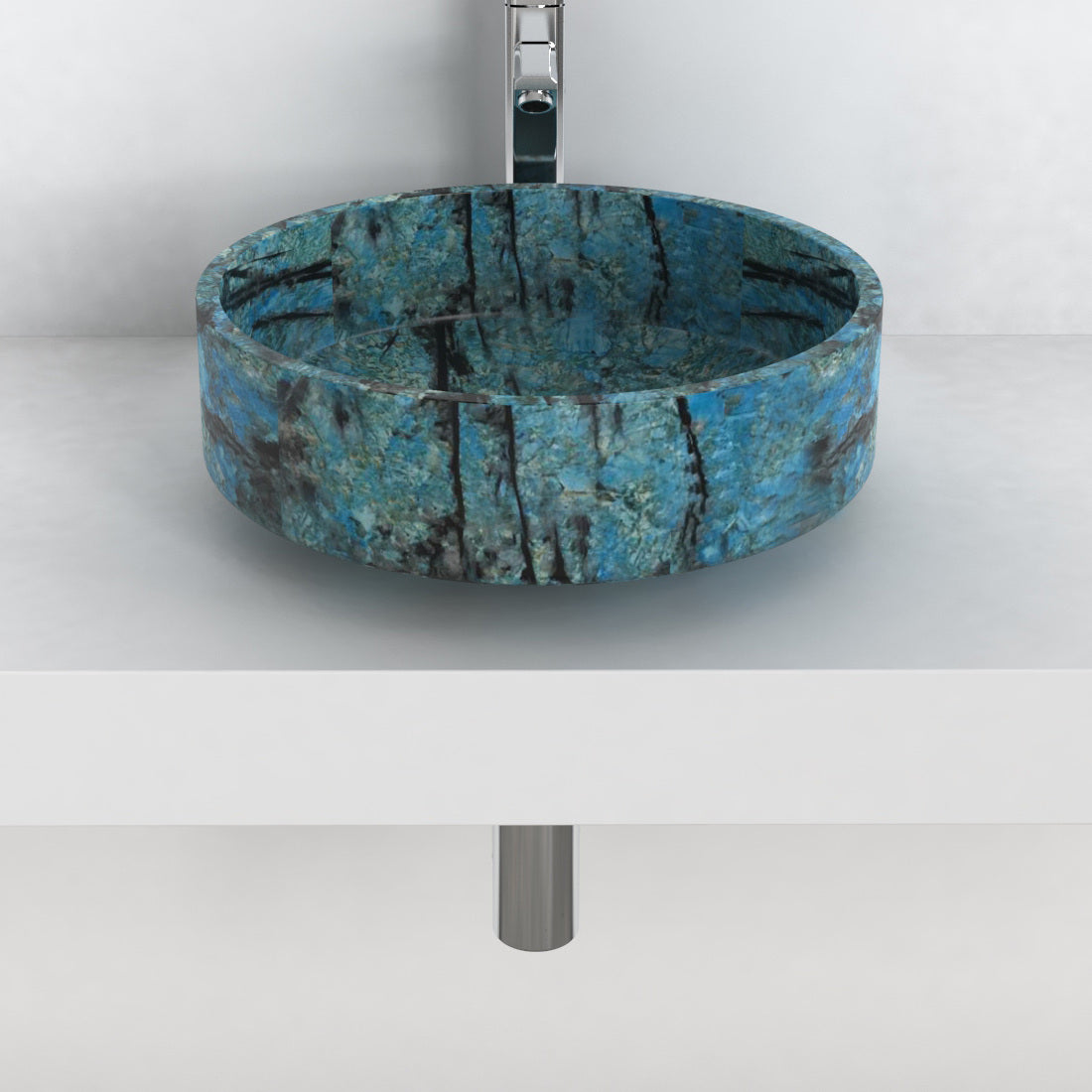 Front view of the round Shadi blue stone vessel sink on a countertop