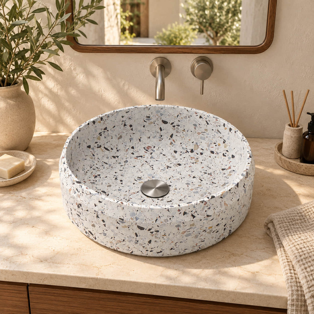 Shaila Sky Terrazzo vessel sink in a warm courtyard bathroom