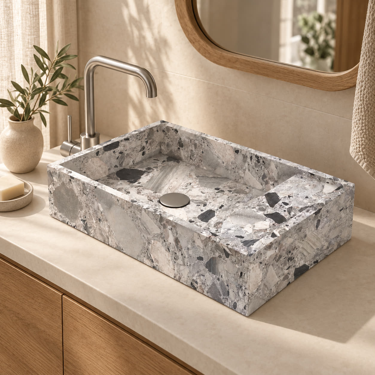 Simona Carnico Marble rectangular vessel sink in a warm ivory and oak bathroom