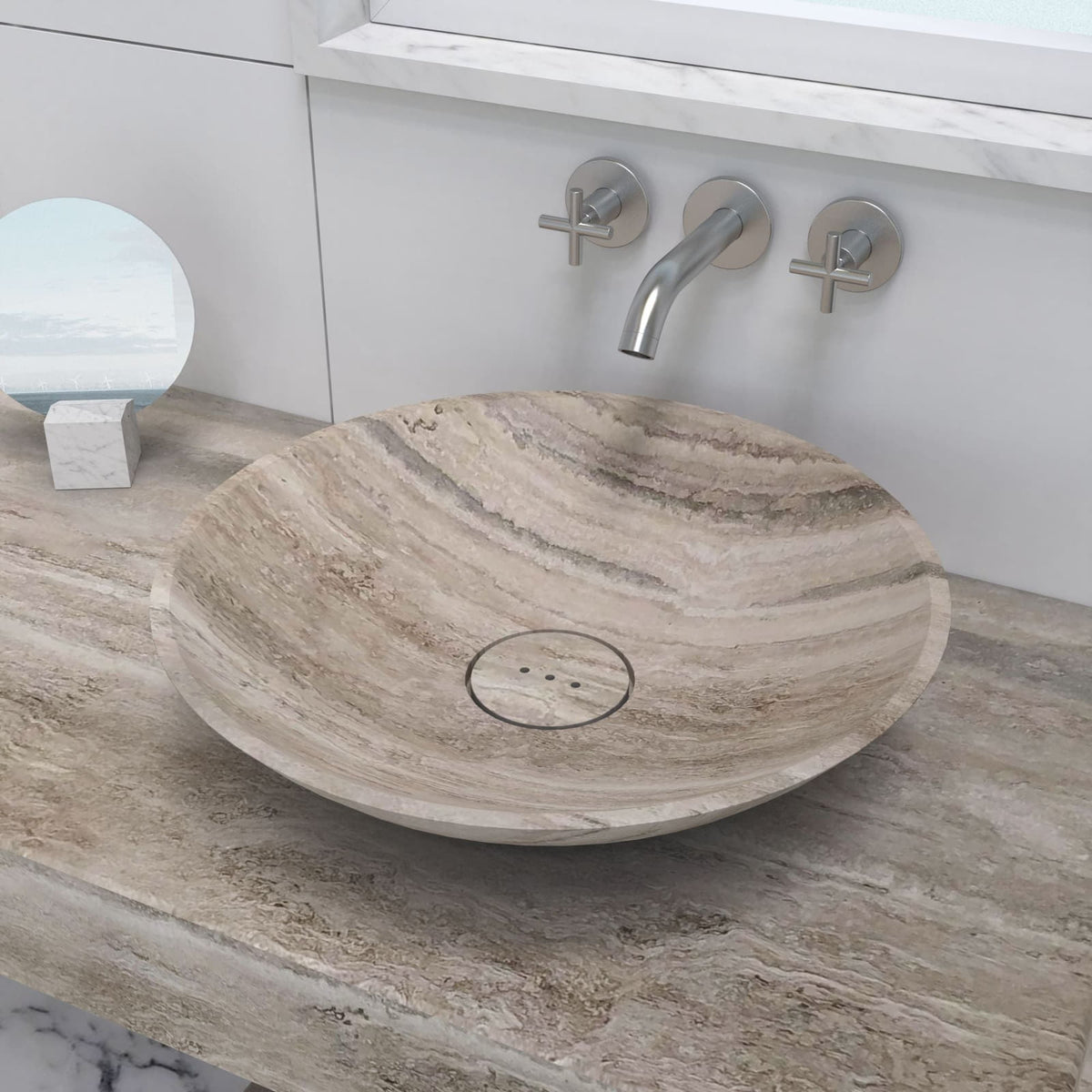 Close overhead view of the Sadika travertine sink bowl and circular drain