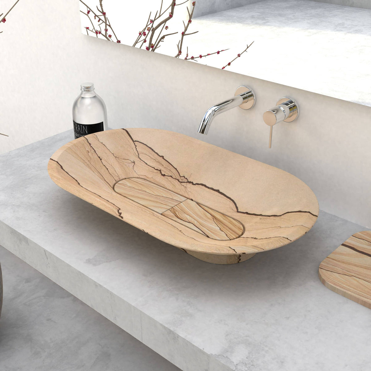 Angled view of the Selia sandstone vessel sink with dark natural veining