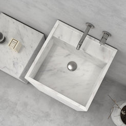 Top view of the Panini Carrara marble sink showing the square bowl and drain