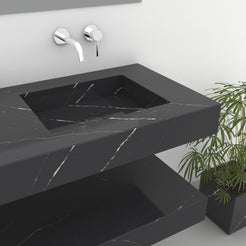 Close view of one Taipa Portoro marble basin and the veined front edge