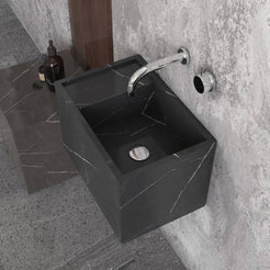 Overhead angled view of the Tilika Portoro marble sink and rear ledge