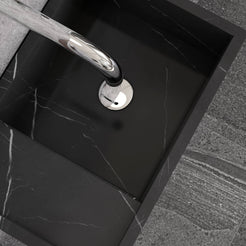 Overhead close-up of the Tilika Portoro marble basin and drain