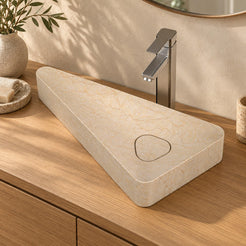 Illustrative oak vanity setting with the Sabala asymmetric triangular Crema marble basin
