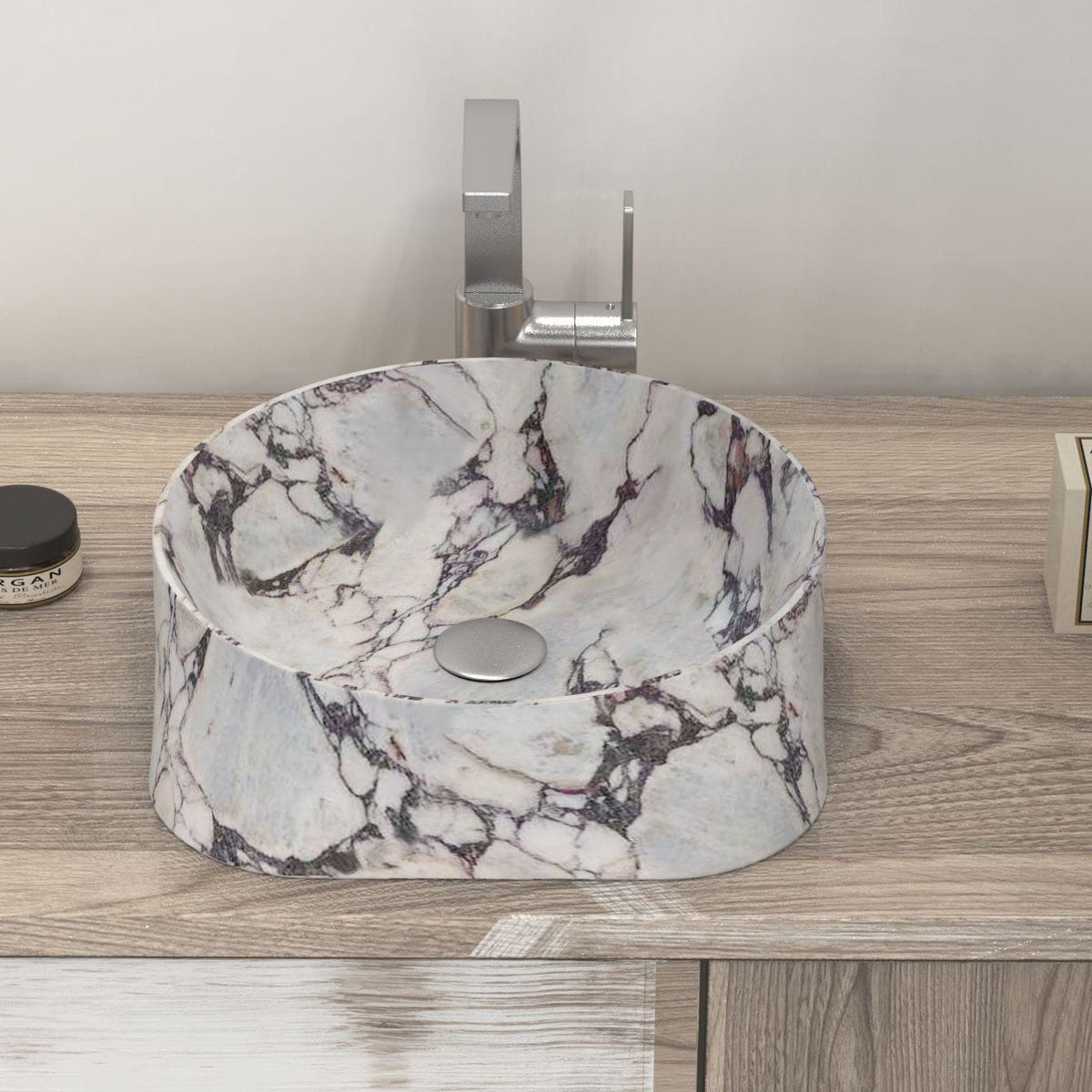 Safira front view of the curved marble bowl on the vanity