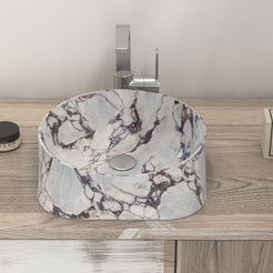 Safira front view of the curved marble bowl on the vanity