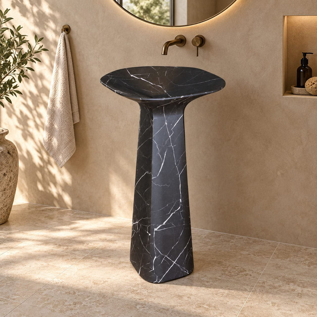 Polona Portoro Black Marble Pedestal Sink — complete rounded-rectangular basin and pedestal in a warm bathroom