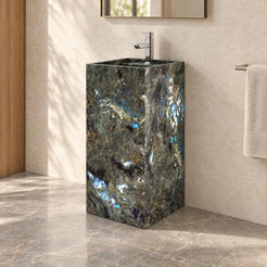 Panini Celestia Blue Quartzite Pedestal Sink — complete floor-standing column in a warm oak and limestone bathroom