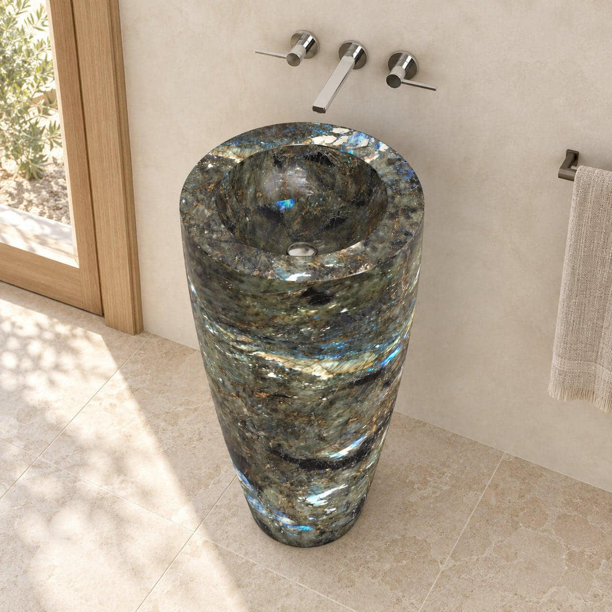 Patty Celestia Blue Quartzite Pedestal Sink — elevated bathroom view showing circular bowl, drain and full floor base