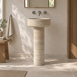 Pata Roman Travertine Pedestal Sink — low frontal full pedestal lifestyle