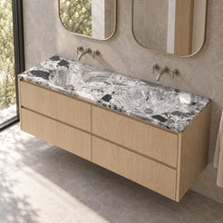 Taimi Carnico Marble Integrated Basin on an oak vanity in a stone-tiled bathroom, showing both sculpted basins and thin stone edge