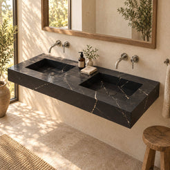 Taipa Portoro marble double trough sink in a warm bathroom with natural light and two rectangular basins