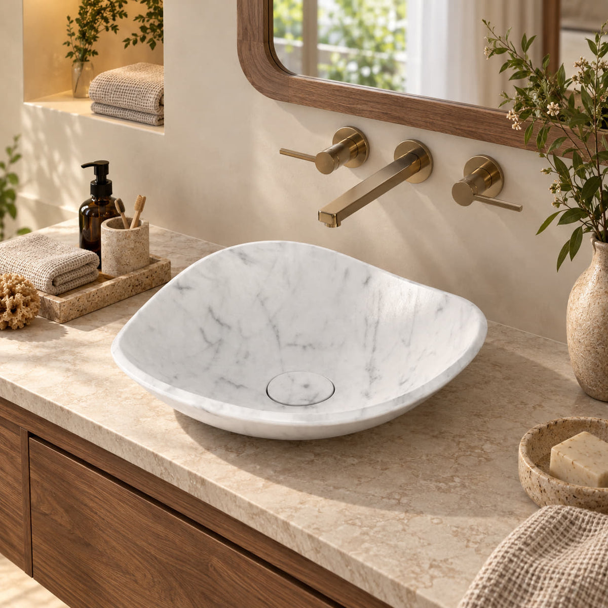 Sita Carrara Marble asymmetric vessel sink in a warm walnut bathroom