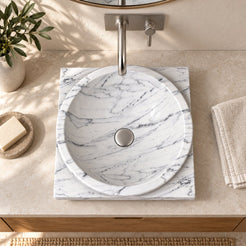 Somaya Carrara Marble Vessel Sink — overhead bathroom lifestyle