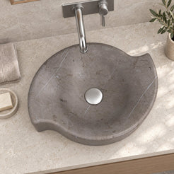 Sommer Perlato Marble Vessel Sink — overhead bathroom lifestyle