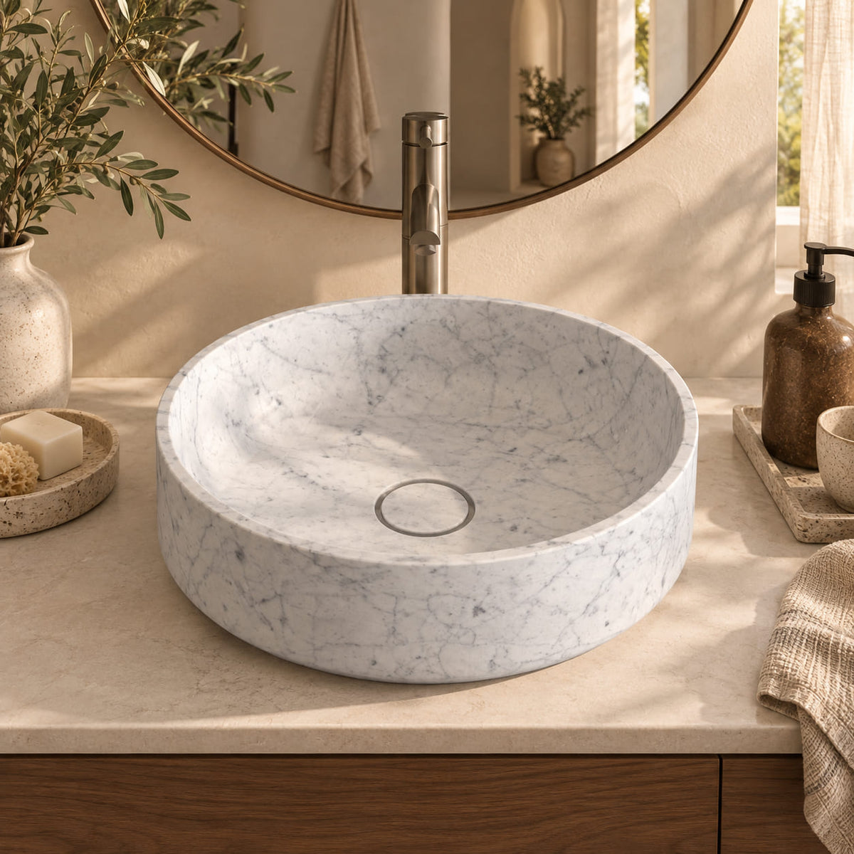 Sonila Carrara Marble vessel sink in a warm Mediterranean bathroom