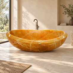 Vespera BT-169A symmetrical oval Honey Onyx bathtub in a warm ivory bathroom, long-side view — styled lifestyle visualization.