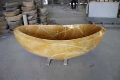 Yuna BT-032A-HO Honey Onyx bathtub, original product reference view; source photograph reframed without changing the stone, rim or silhouette